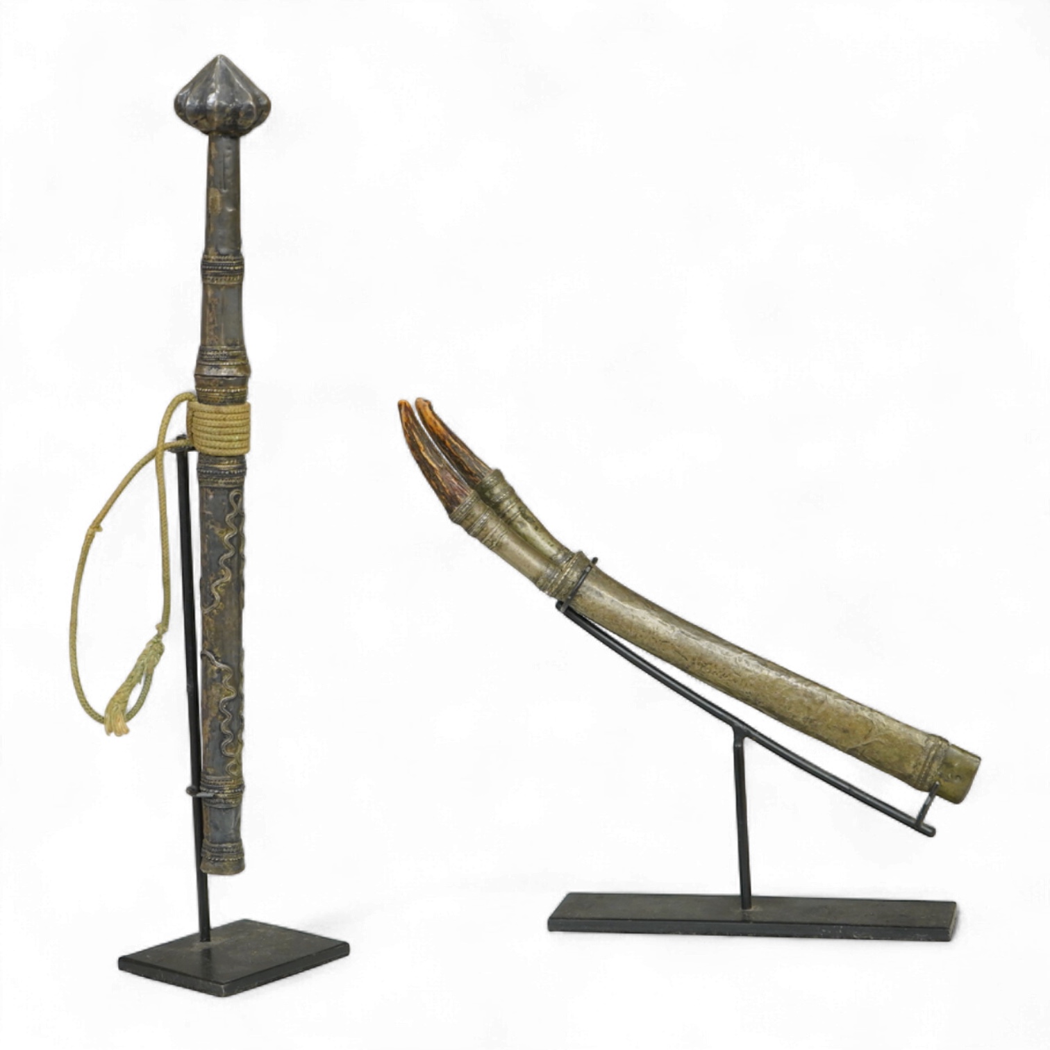 A Burmese dagger dha, blade 14.5cm, hilt and sheath covered in sheet silver filigree decoration, together with an unusual pair of small Burmese knives with silver mounted stag horn handles and silver covered sheath, both